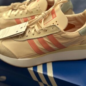 SOLD
Adidas Women's Beige and Coral Sneakers